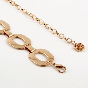 Fashionable gold metal chain belt for dresses with an elegant rose pendant design