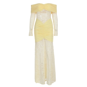 Close-up of elegant off-shoulder light yellow lace dress with gathered fabric and chic design