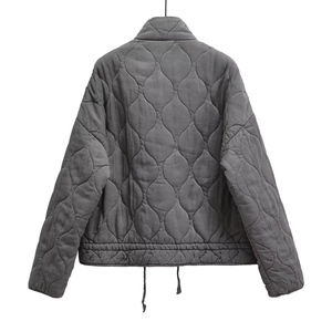 Rear view of a dark gray quilted jacket featuring onion-shaped stitching and drawstring hem