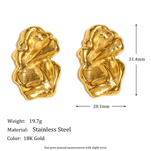 Detailed view of 18K gold stainless steel earrings with irregular twisted texture and specs