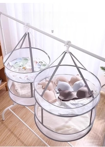 Close-up of a double-layer folding mesh drying rack for flat drying sweaters and socks