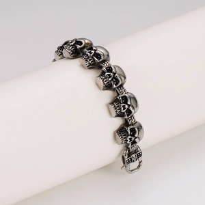 Punk style stainless steel skull link bracelet in vintage silver and oxidized black finish