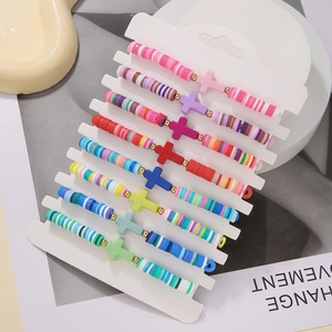 Set of 9 colorful Bohemian Heishi bead bracelets with cross charms for beach style