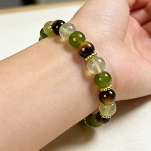 Elastic beaded sports bracelet with multi-colored 8mm beads and golden metal spacers