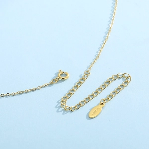 Golden stainless steel necklace featuring star moon pendant and adjustable spring clasp