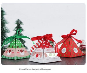 Pyramid Christmas gift boxes with reindeer and Santa patterns, tied with festive ribbons