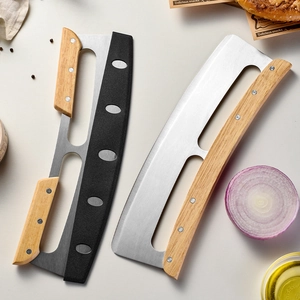 Dual stainless steel rocker pizza cutters with wooden and black handles on a table
