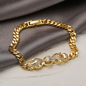 Hip hop 18K gold plated Cuban chain bracelet featuring dual leopard heads with zircons