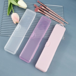 Three colorful plastic storage boxes for makeup brushes with secure buckle design