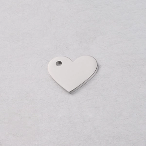 Detailed view of a polished stainless steel hollow heart-shaped charm for DIY jewelry