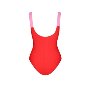 Detail of red one-piece swimsuit with pink straps and deep U-neckline in studio view