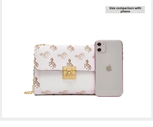 Detailed size comparison of white PU leather crossbody bag next to a smartphone