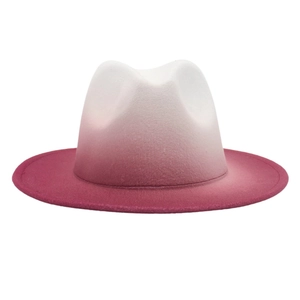 Detail view of the smooth gradient transition from white to pink on the felt fedora hat