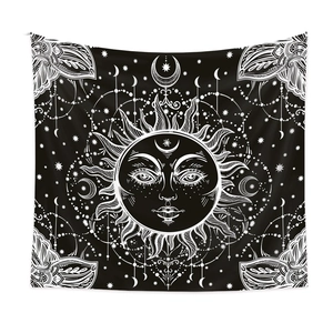 Detail of sun and moon mandala tapestry featuring celestial astrology patterns