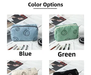 Collage of corduroy pouches with smiley faces in blue, green, off-white, and black colors