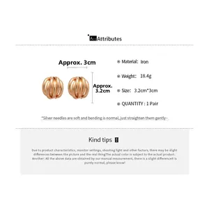 Detail showing dimensions and material of multi-layer rose gold textured ball earrings