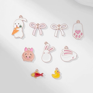 9pcs set of colorful enamel charms featuring rabbits and bows with gold metal finish