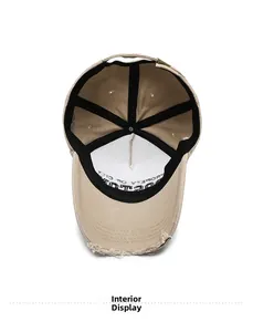 Detail of khaki distressed baseball cap interior showing 6-panel structure and lining
