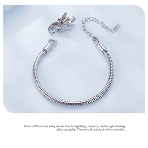 Detail of 925 sterling silver snake chain bracelet with butterfly lobster clasp and extension