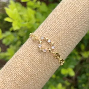 Bracciale in rame placcato oro 18K con ciondoli a stella e cuore scintillanti per uomo e donna