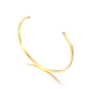 Minimalist C-shaped open cuff bracelet in polished gold finish for women