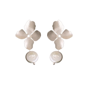 Elegant silver metal flower earrings with freshwater pearl drop on white background