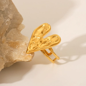 Minimalist 18K gold plated heart ring featuring unique hammered texture on stone base