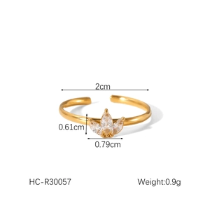 Macro view of adjustable gold ring featuring marquise zircon stones with dimensions