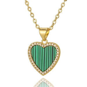 Golden heart necklace featuring a green striped malachite stone with white zircon borders