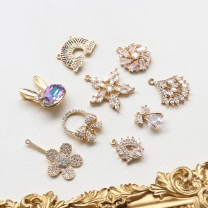 Mix of zircon-set charms including snowflake, rabbit, and rainbow for DIY jewelry