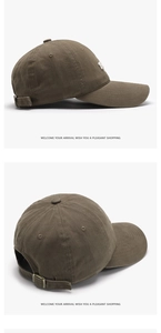 Detail of cotton baseball cap with side embroidery and adjustable metal buckle