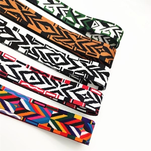 Detailed view of various ethnic style jacquard woven replacement straps for shoulder bags
