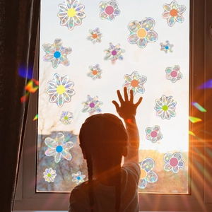 Rainbow suncatcher flower window stickers showing prism effects and colorful floral decals
