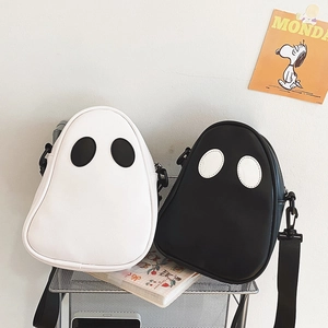 Quirky devil ghost crossbody bags in black and white leather with large eye design
