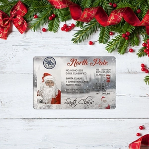 Macro detail of Santa Claus Sleigh License card with pine branches on white wood background