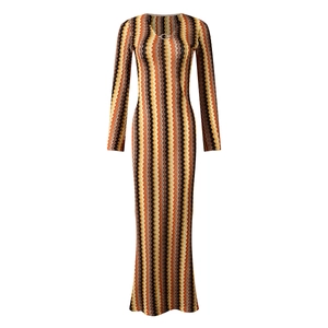 Detail of vintage zigzag knit pattern and metal ring neckline on a slim long sleeve dress
