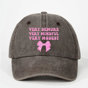 Dark grey washed cotton baseball cap with pink Very Demure print and bow detail