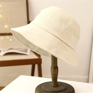 Chic beige waffle knit bucket hat for women, casual autumn style for sun protection