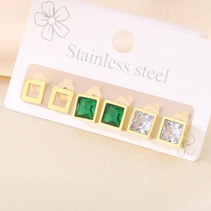 Macro detail of three-pair square stainless steel stud earring set in gold and green