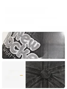 Detail of 3D embroidery on washed cotton denim baseball cap with premium stitching