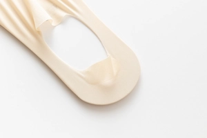 Close-up of beige low cut no show sock with breathable ice silk fabric and non-slip design