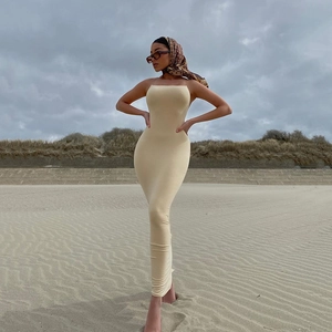 Sexy beige backless bodycon maxi dress with spaghetti straps and split hem for beach