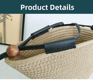 Detail of woven rope tote bag featuring black leather handle and brown wooden bead accent