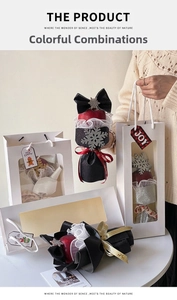 Close-up of a Christmas apple gift set with glitter wrapping and a snowflake charm