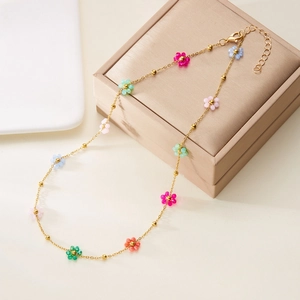 Chic gold-plated necklace with colorful beaded flowers and adjustable lobster clasp closure