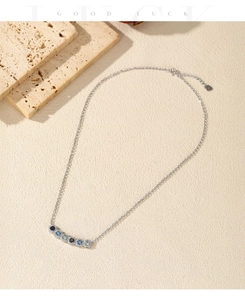 Detailed macro view of S925 silver necklace featuring gradient blue round diamonds