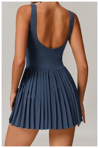 Deep blue sports dress with U-shaped back and pleated skirt for tennis and fitness