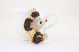 Detailed view of Mickey Mouse keychain with black and clear rhinestones and red eye