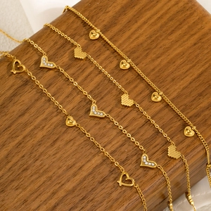Double-layered gold titanium steel heart necklace with cubic zirconia pendant set