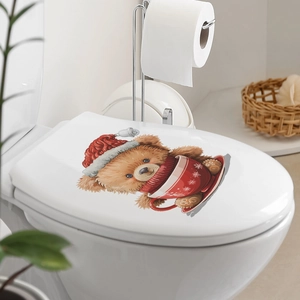 Sticker de toilette de Noël avec un ours mignon portant un bonnet rouge et une tasse